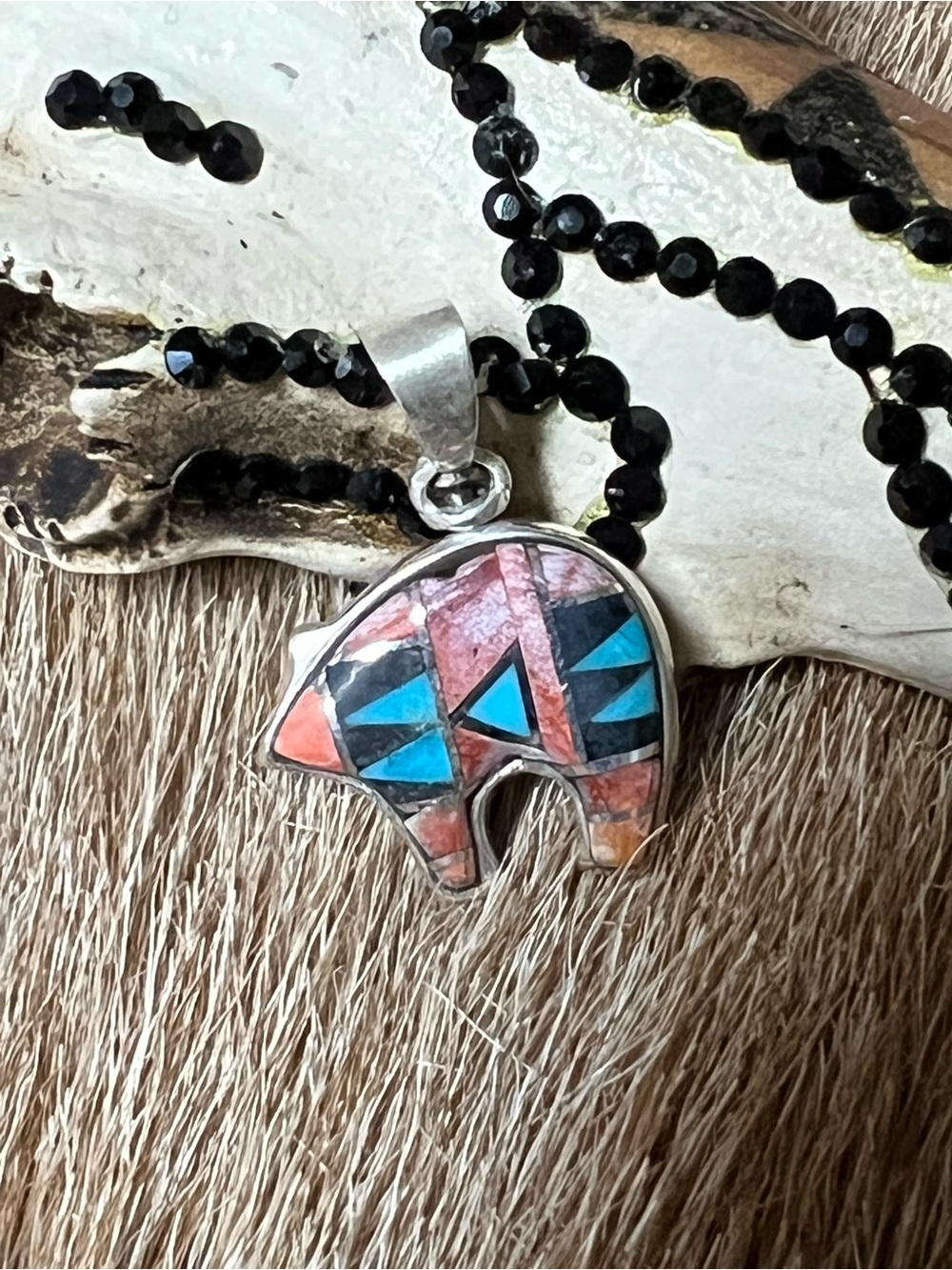 Sterling silver reversible bear pendant